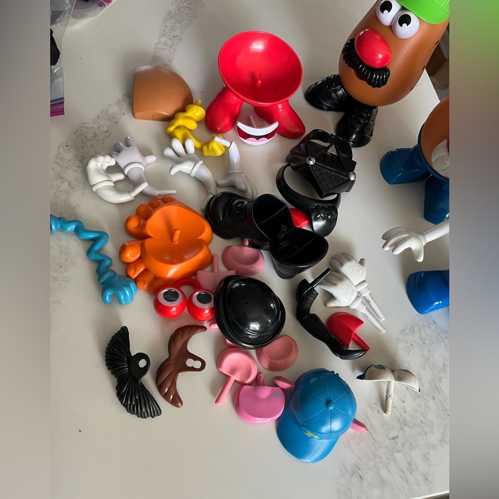 Mr potato head and accessories. Includes three potato heads. - Picture 2 of 5